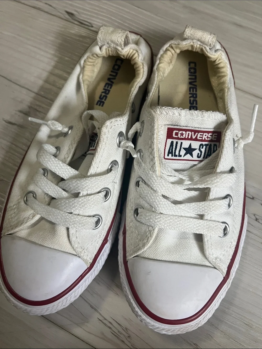 Converse Kids Low Top Sneakers in White with Red Stripe